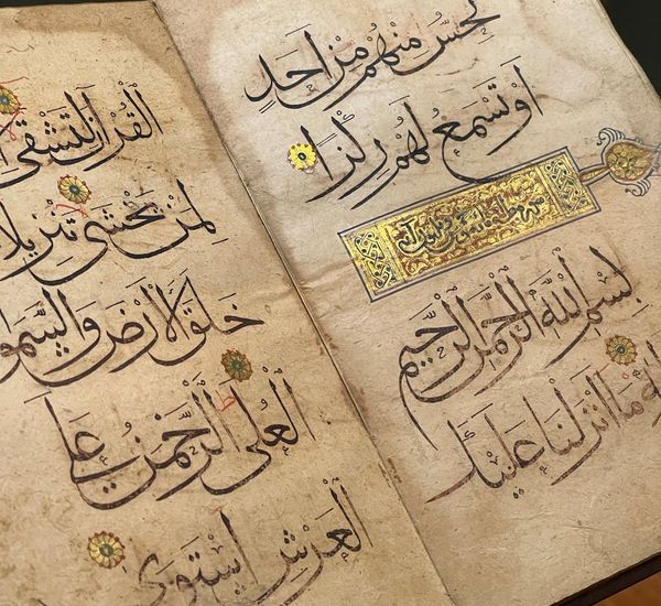Ancient scroll with abstract symbols representing history and knowledge.